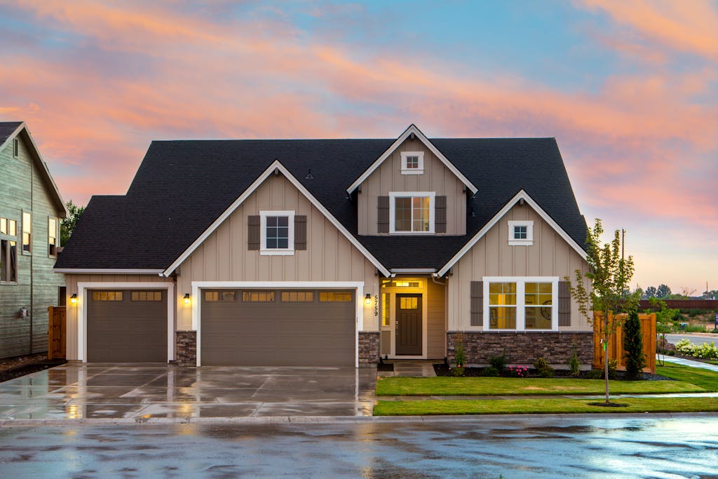 Charming family home in Boise, ID with a modern facade and spacious garage.